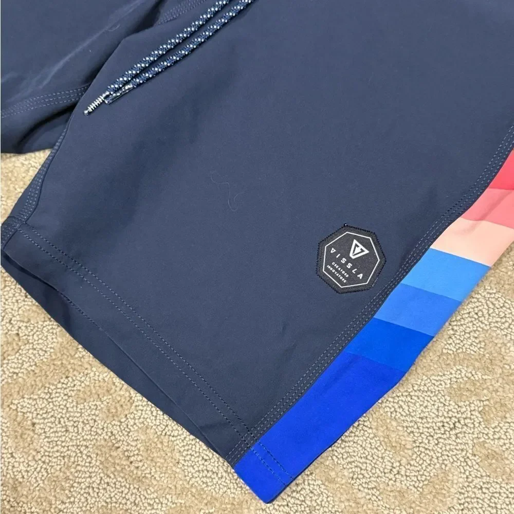 VISSLA Men’s 31 Dark Blue Board Shorts with Red and Blue Rainbow Stripes